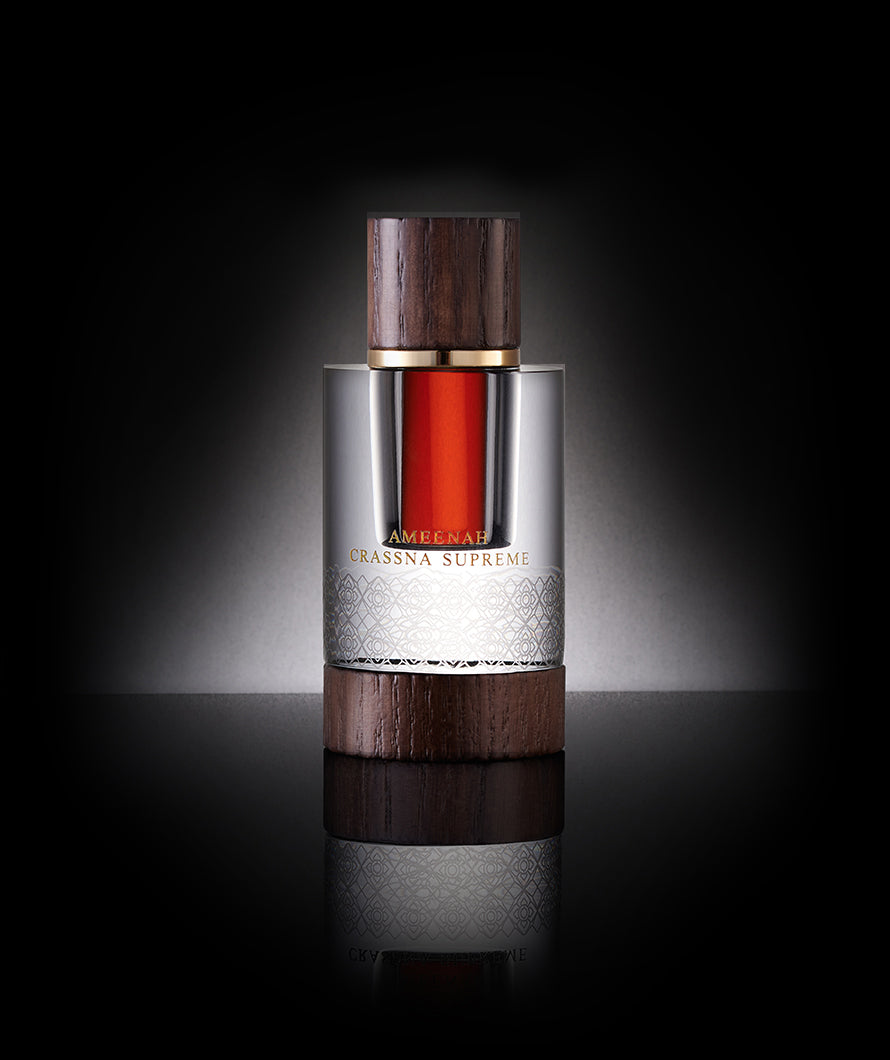 Close-up of Crassna Supreme Dehn Al Oud bottle a rich and sweet oud oil with nutty and honey notes, reflecting strength, prestige, and powerful presence.