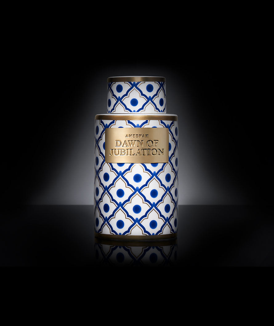 Ameenah Dawn of Jubilation Bakhoor Vase releasing warm spicy-woody smoke, symbolizing the optimism and renewal of dawn.