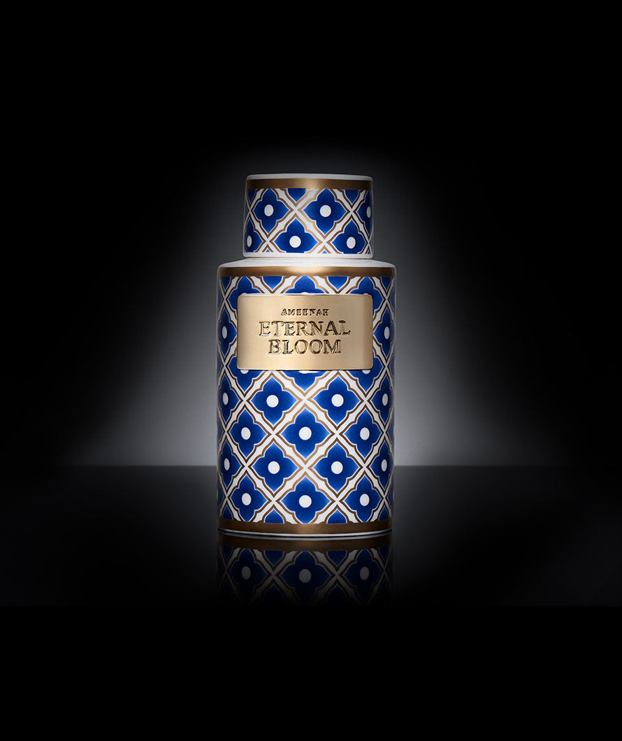 Close-up of Ameenah Eternal Bloom Bakhoor Vase emitting soft floral and ambery smoke, symbolizing an endless garden of life and harmony.