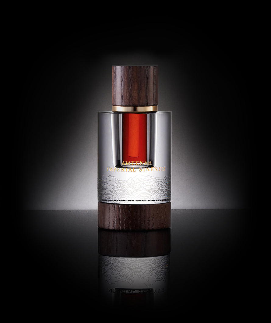 Close-up of Imperial Sinensis Dehn Al Oud bottle a woody, deep, balsamic oud oil symbolizing strength, heritage, and the legendary spirit of ancient China.