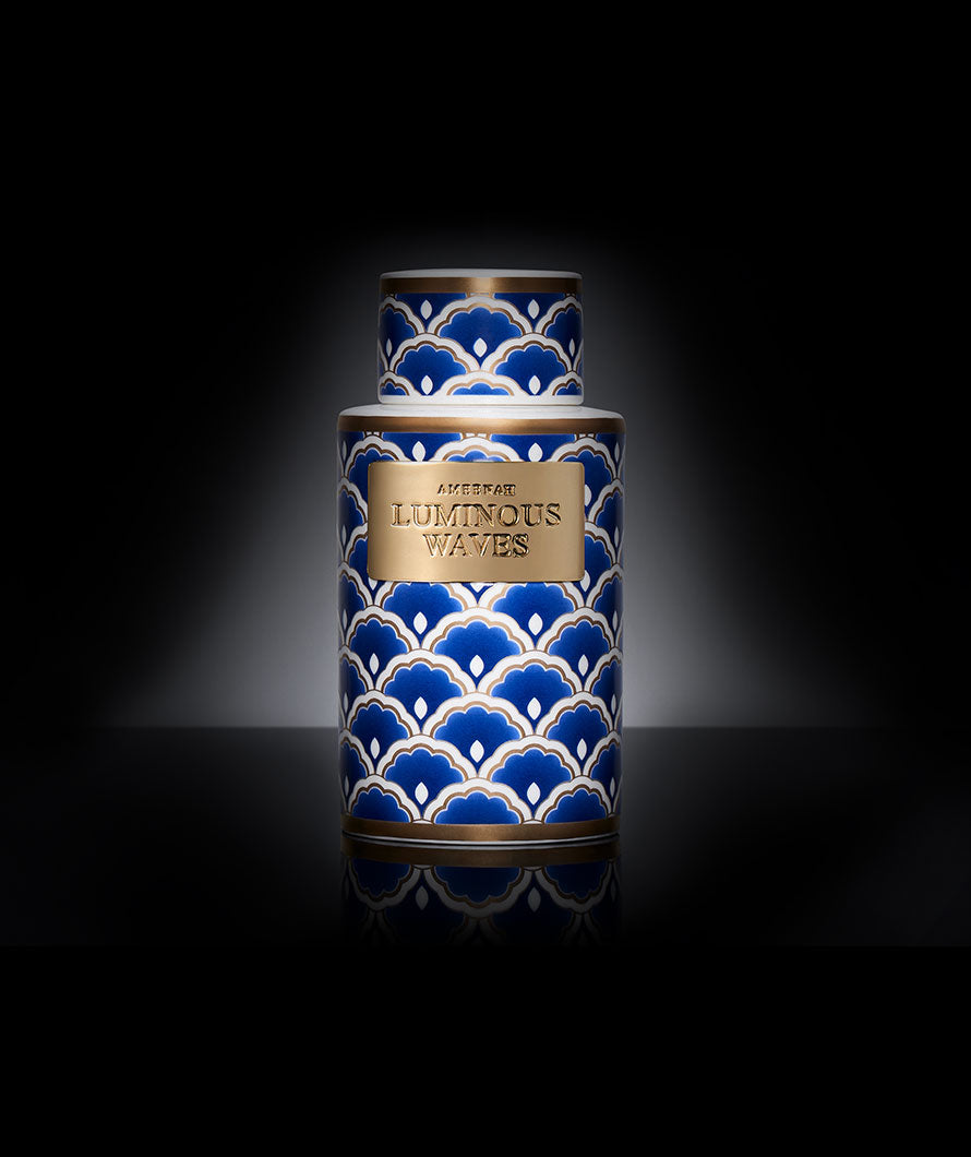 Ameenah Luminous Waves Bakhoor vase emitting soft fragrant smoke inspired by candlelight, blending floral and woody notes in serene harmony.