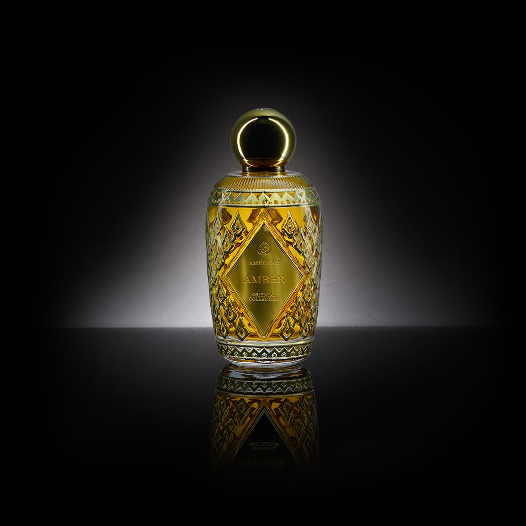 Radiant unisex Extrait de Parfum bottle with amber and oriental notes