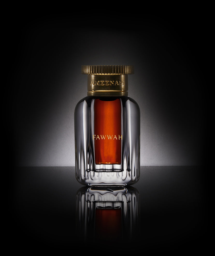 Close-up of Fawwah Dehn Al Oud bottle of floral and fruity oud oil from Ameenah, celebrating heritage with a timeless and passionate scent.