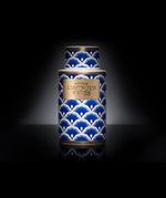 Ameenah Luminous Waves Bakhoor vase emitting soft fragrant smoke inspired by candlelight, blending floral and woody notes in serene harmony.