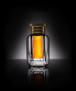Close-up of Ameenah Sayufi Dehn Al Oud bottle, a bold woody and smoky oud oil extracted from rare Malaccensis wood
